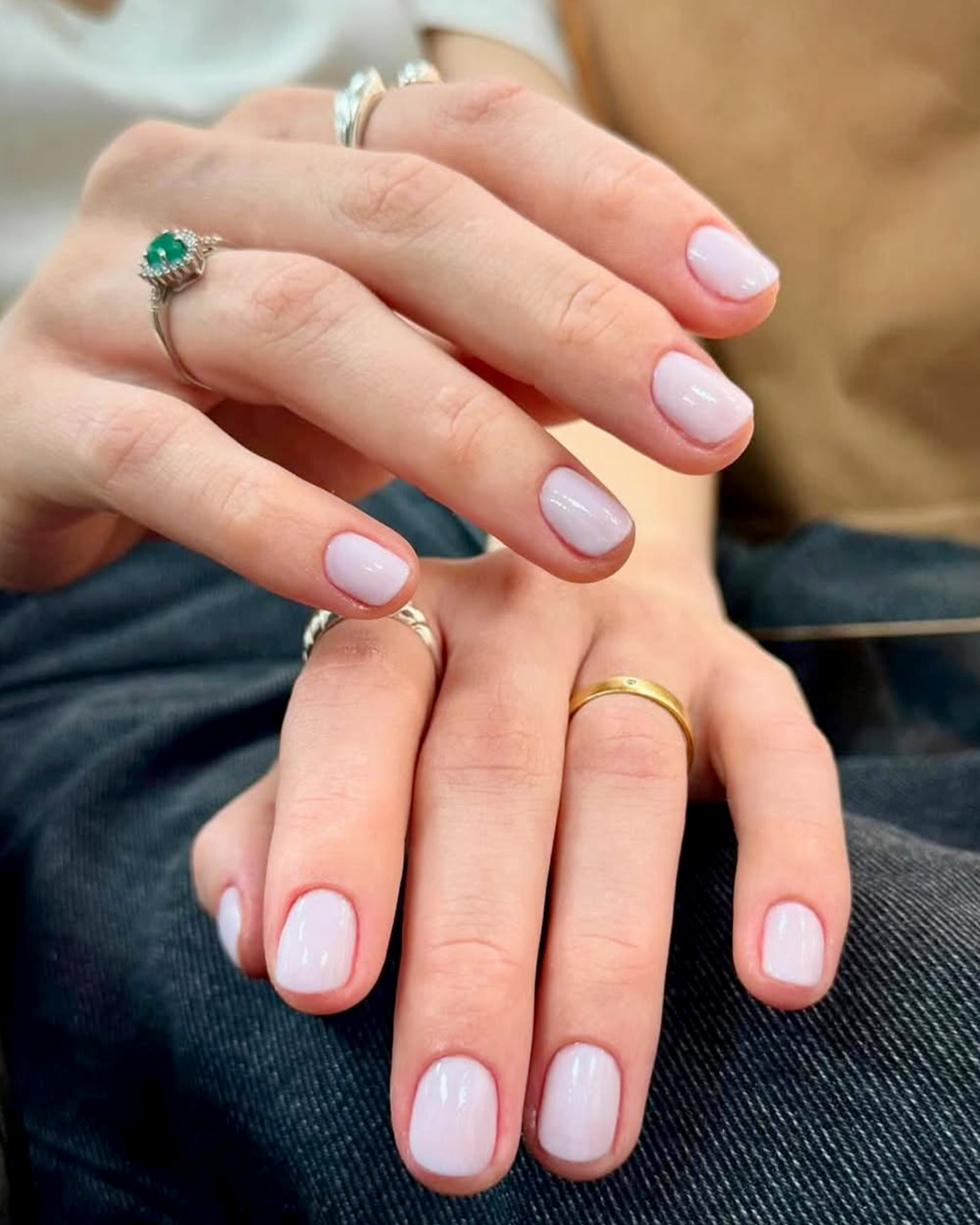 Milky white short nails with glossy natural look