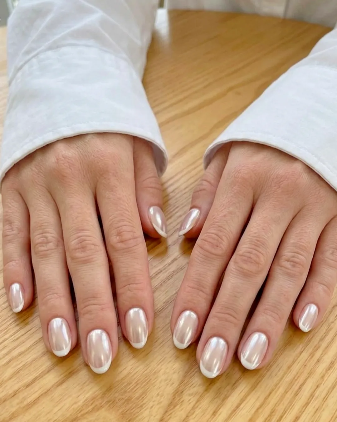 Best Short Nails Trends in Texas: 8 Stylish Designs from Plush Nail Bar You’ll Love 2 Chrome French tip short nails with pearl metallic finish