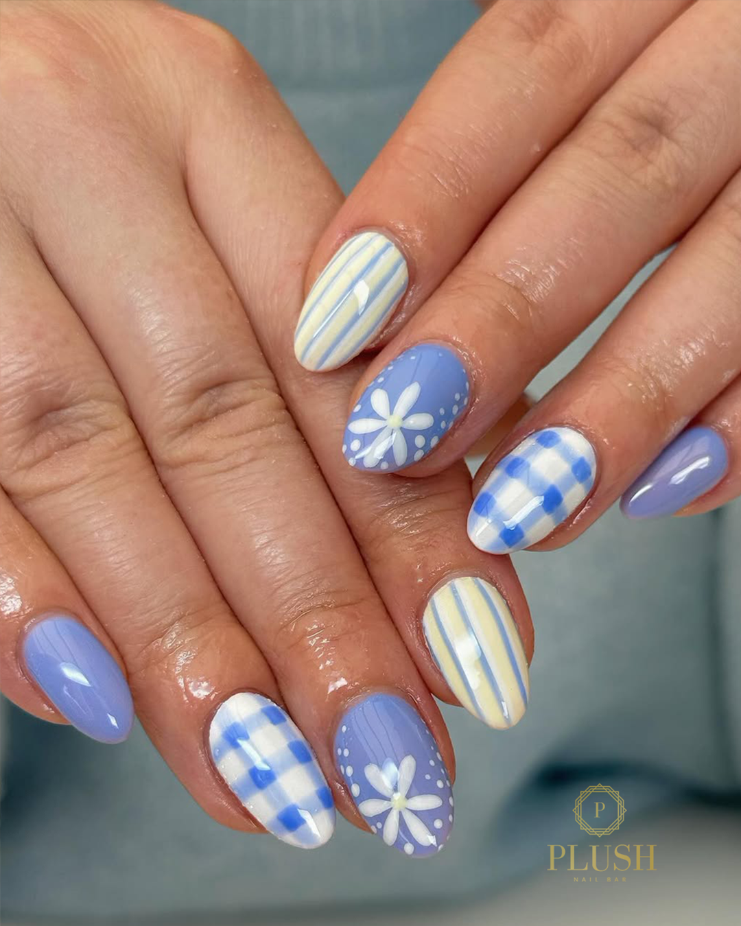 blue floral nails with gingham pattern and daisy nail design trendy nails Texas