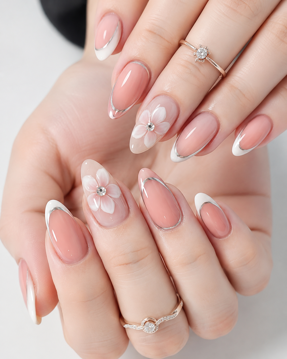 Silver outline 3D floral french nail with delicate white petal art