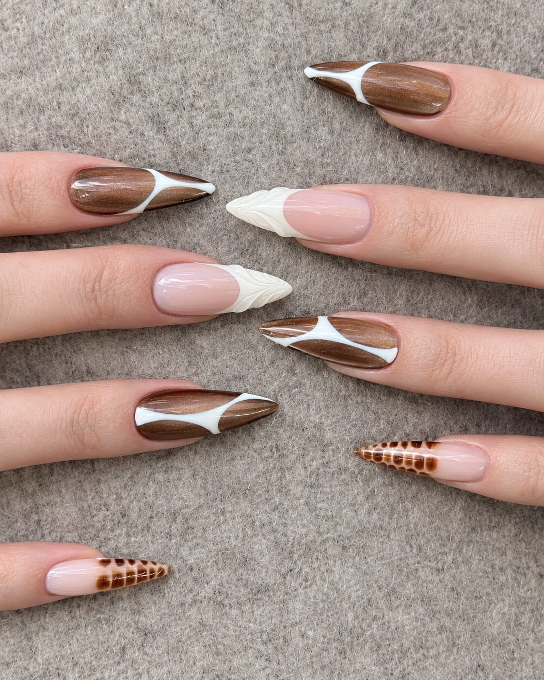 Mocha brown stiletto nails featuring cable knit sweater texture and crocodile print