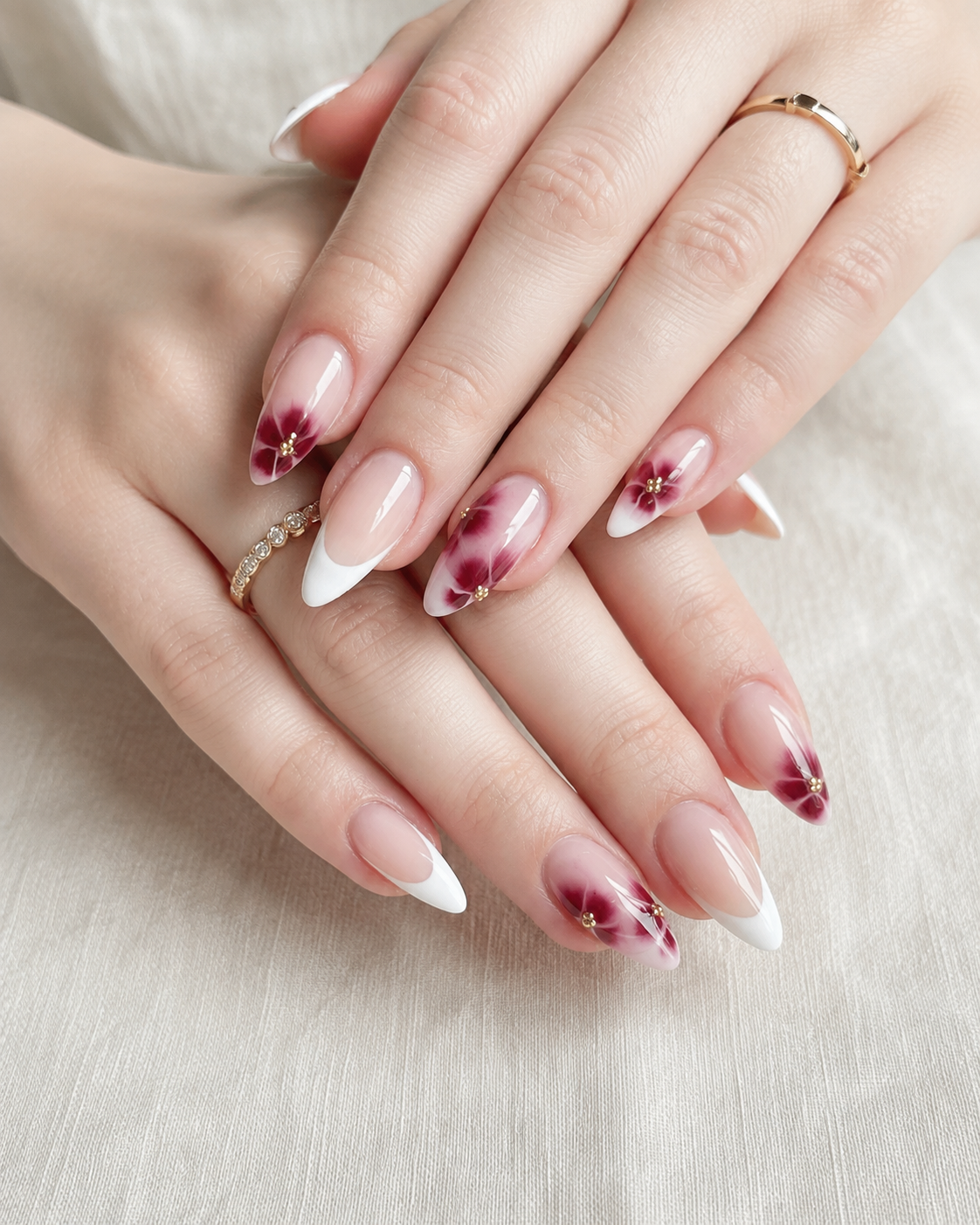 Watercolor burgundy floral french nail with wine-red blooms