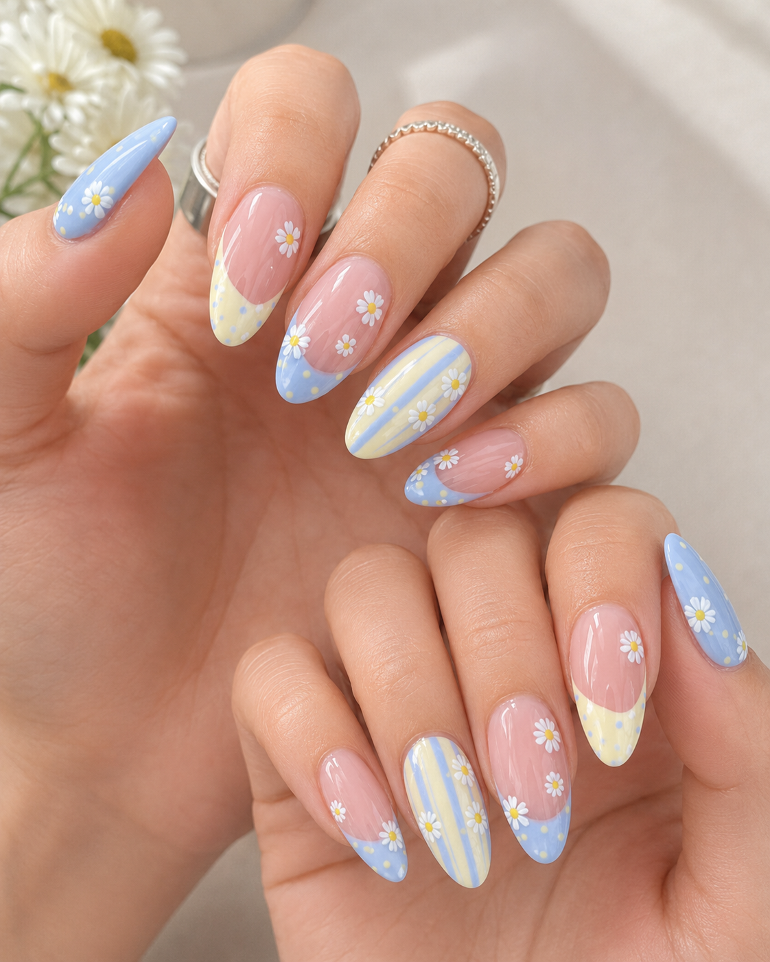 7 Flower Nail Designs for a Fresh, Feminine Manicure 4 A pastel floral French tip manicure with soft blue, yellow, and pink flower details.
Alt text: Flower French tip nail design featuring pastel blue, yellow, and pink tips with delicate floral accents. This fresh manicure is perfect for flower French tip nails, pastel flower nails, cute floral nails, spring nail art, and feminine flower nail designs.