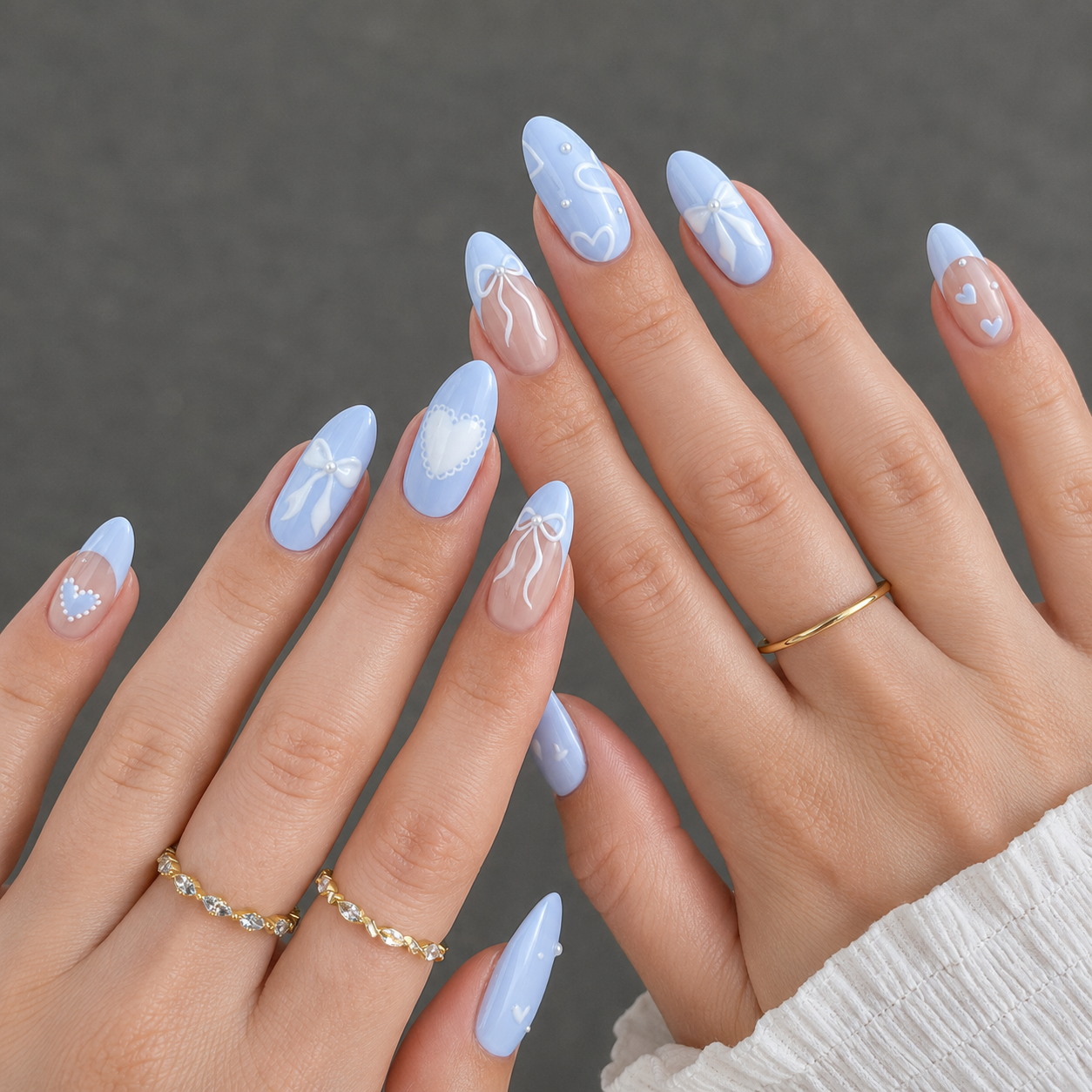 Coquette Baby Blue Nails with bows hearts and pearl details