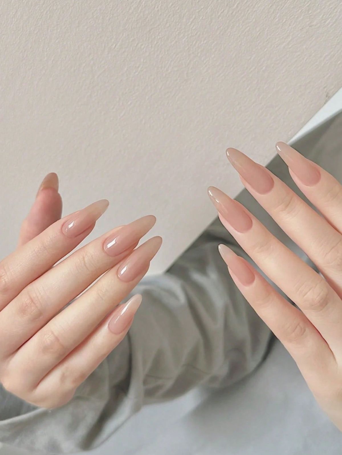 Milky nude almond-shaped manicure – Nail Color Trends for Fall 2025