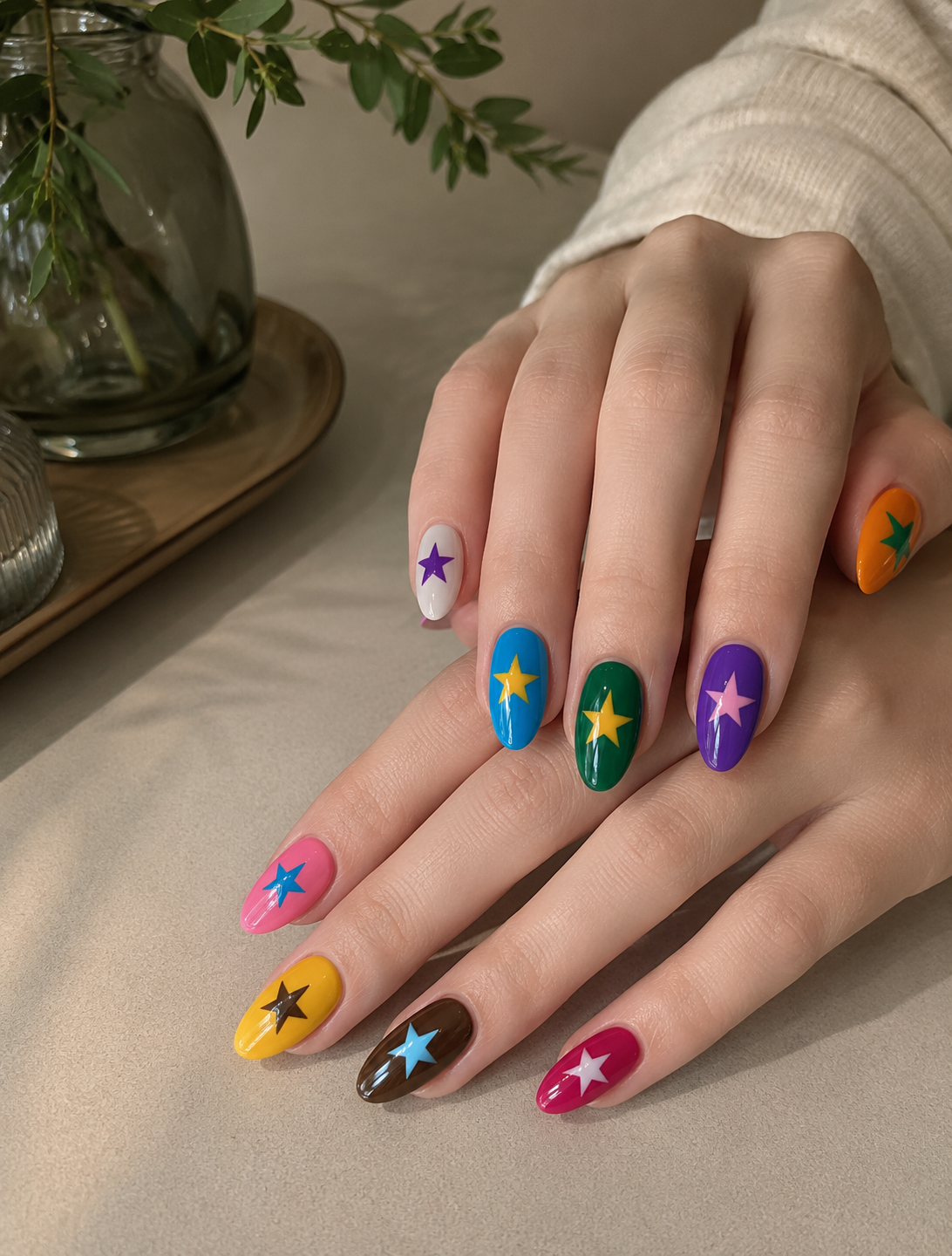 Colorful star nail art featuring vibrant summer shades and playful patriotic-inspired designs for July 4th nail trends.