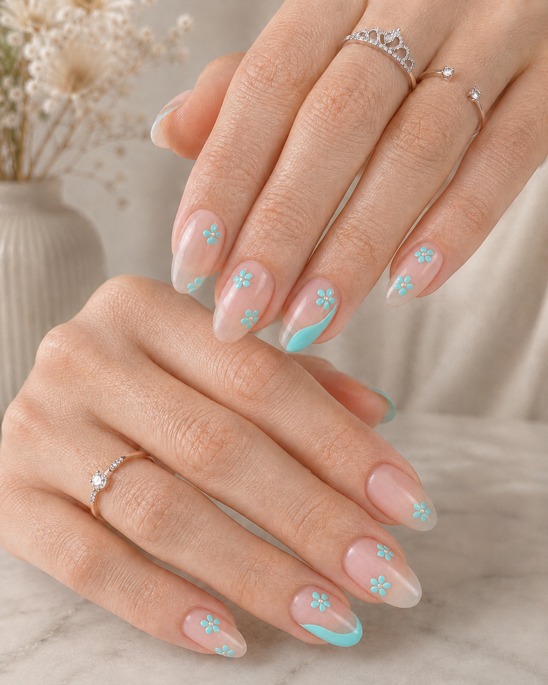Tiffany Nails: The Elegant Manicure Trend Fashion Editors Love 7 Elegant Tiffany floral nails with sheer nude base and delicate blue flower accents