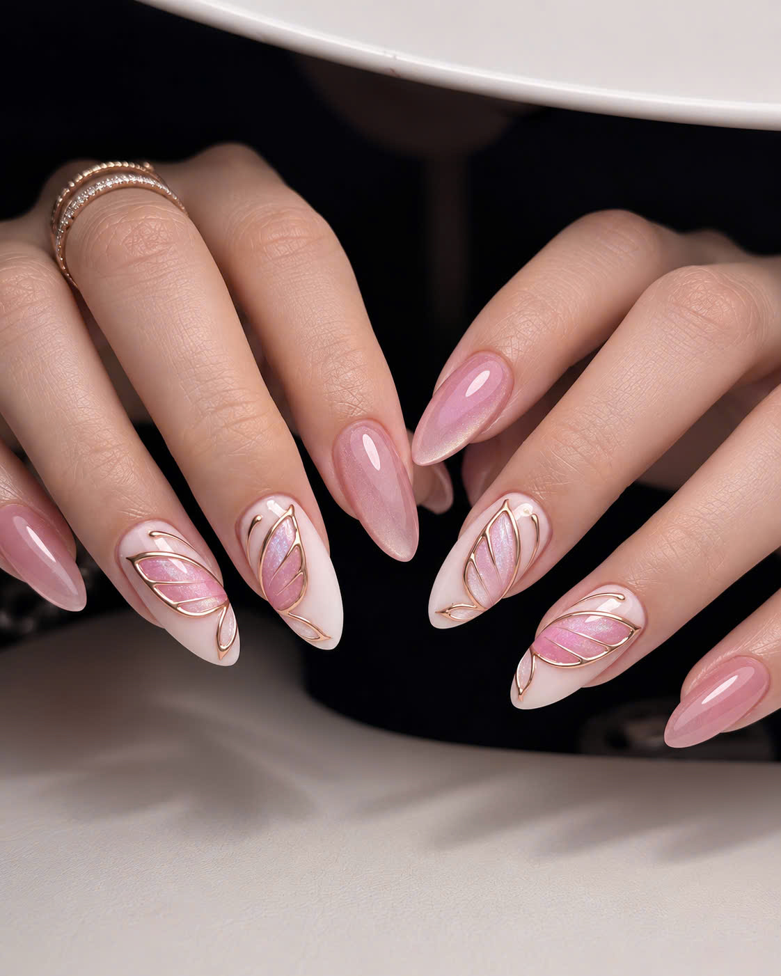 Luxury pink chrome butterfly nails with elegant gold details