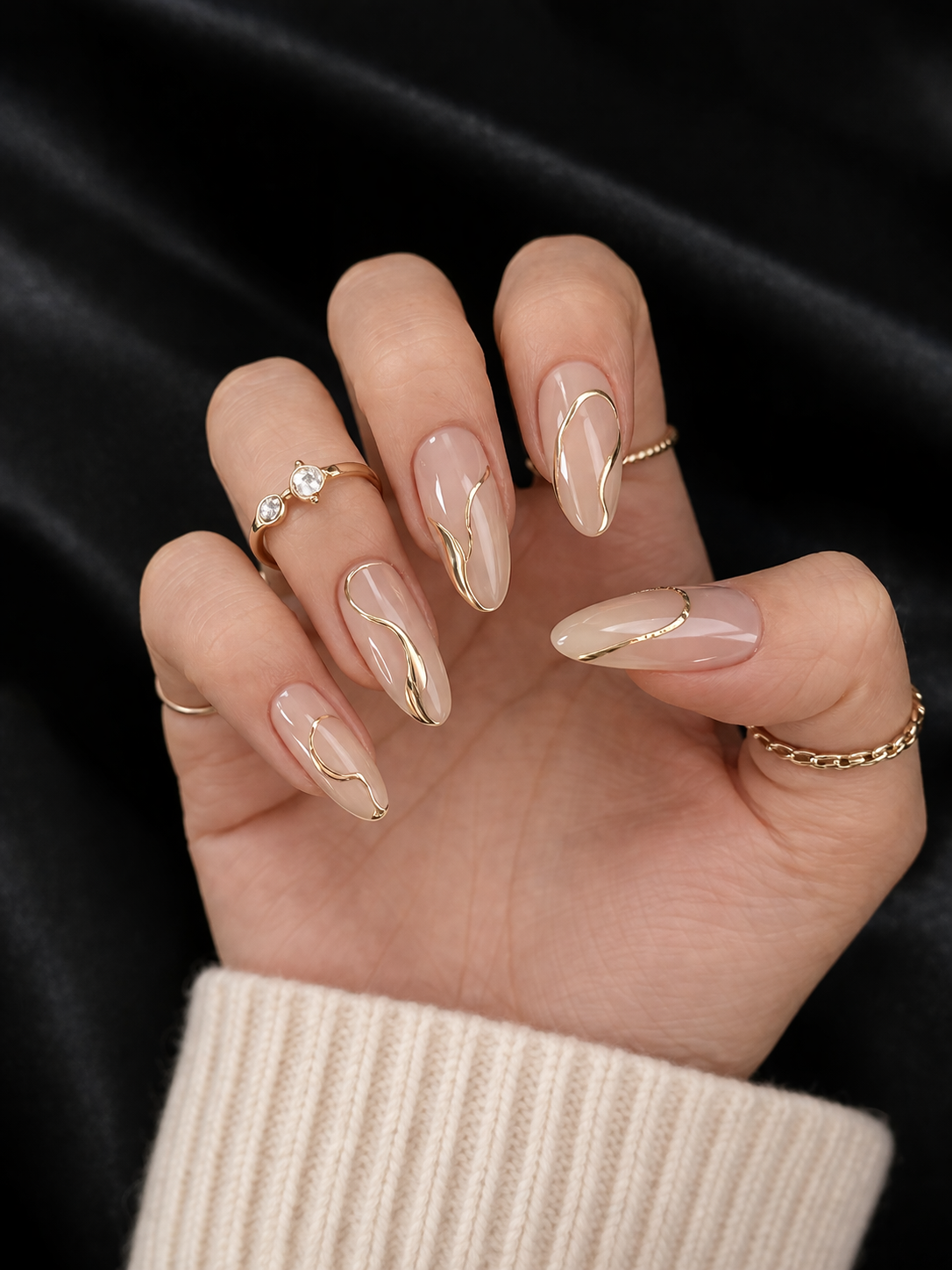 Chic & Simple Mother’s Day Nails Ideas for a Timeless Look | Plush Nail Bar 1 minimalist nude Mother’s Day nails with gold line detail elegant design