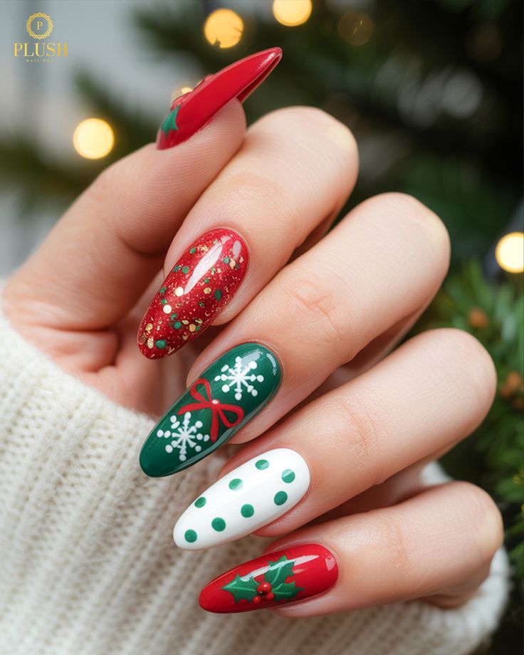 Playful Christmas nails featuring holly leaves, red glitter, green snowflakes, and festive polka-dot white accents by Plush Nail Bar