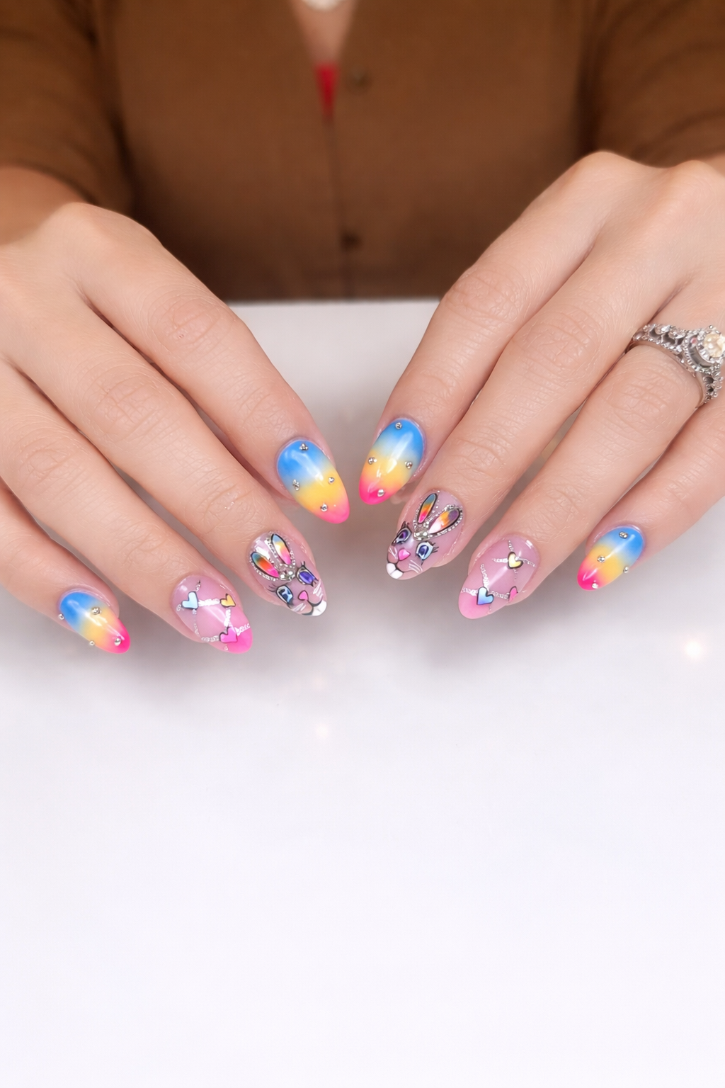 colorful easter nails with rainbow ombre and rhinestones, vibrant spring nail design