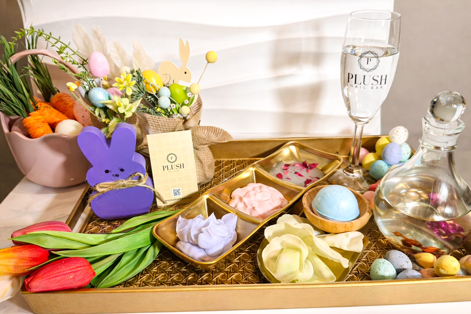 easter nail spa setup with pastel decorations, bunny decor, bath bombs, and plush nail bar luxury salon display