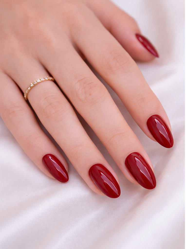 deep red BIAB nails glossy almond shape elegant manicure