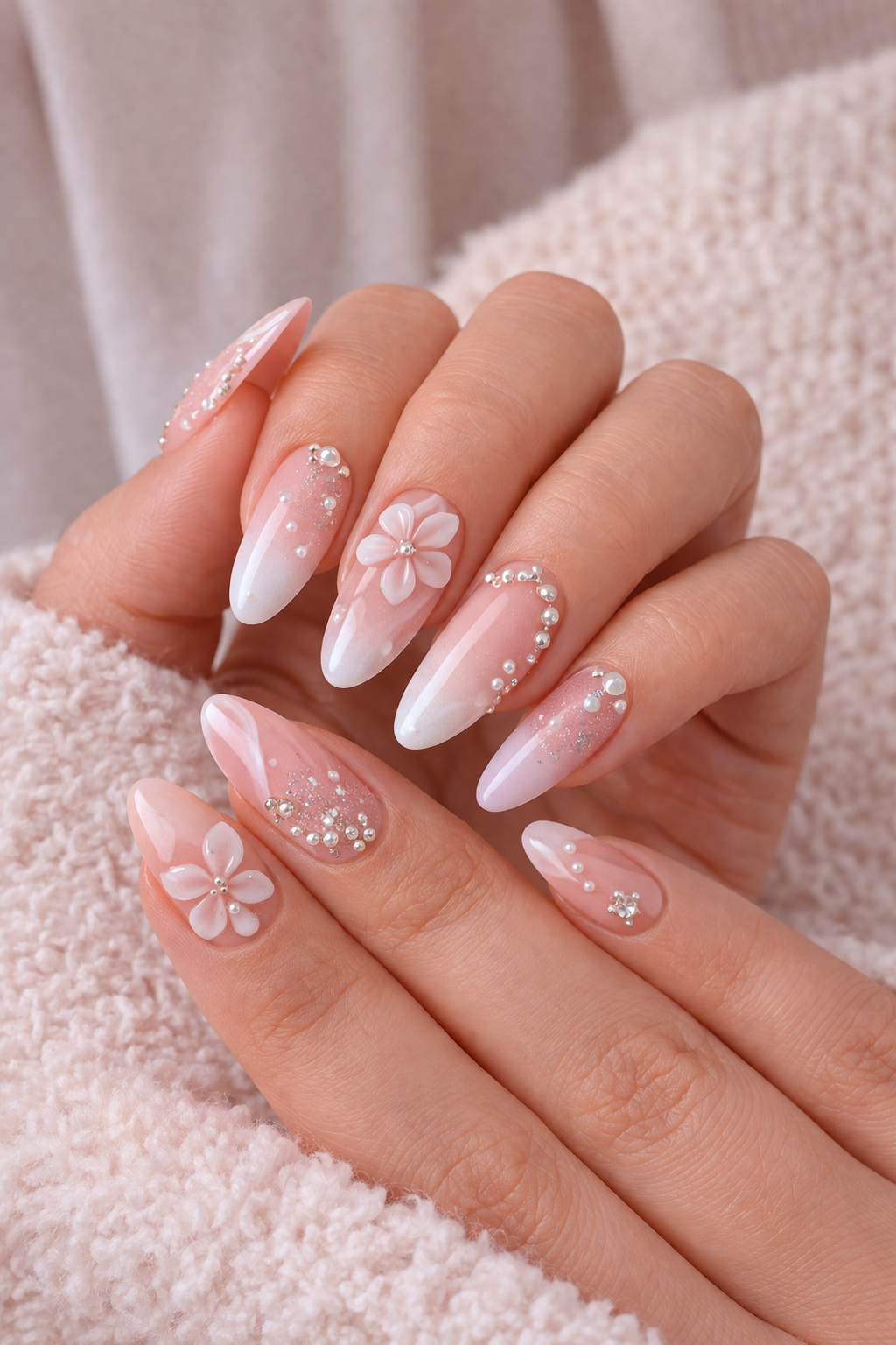 Intricate Crystal Nail design at Plush Nail Bar TX featuring hand-sculpted flowers and delicate micro-pearl accents on a pastel ombre base. A perfect choice for Houston brides and elegant event nails.