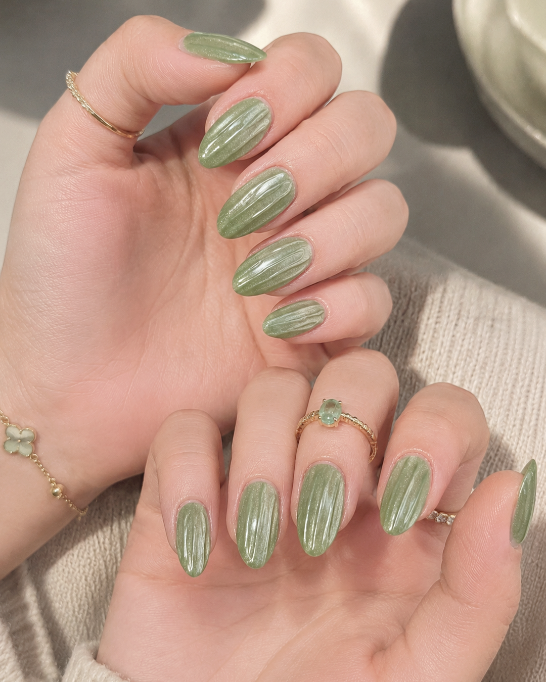 10 Matcha Nails Ideas for a Fresh, Elegant Green Manicure 2 Glossy matcha green cat-eye chrome nails with a dimensional shimmer finish.