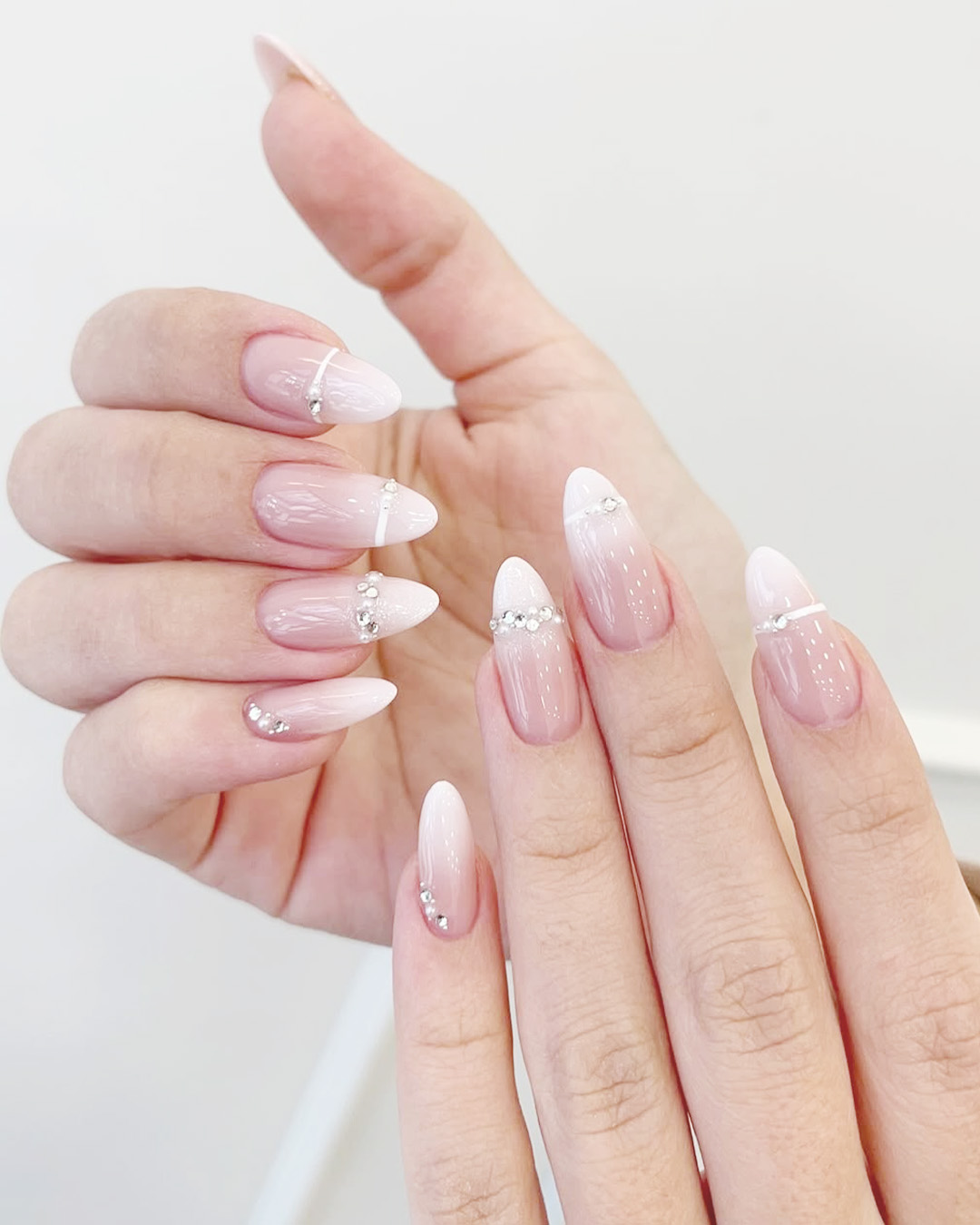 minimalist wedding nails with soft pink base and white tips, classy bridal manicure design