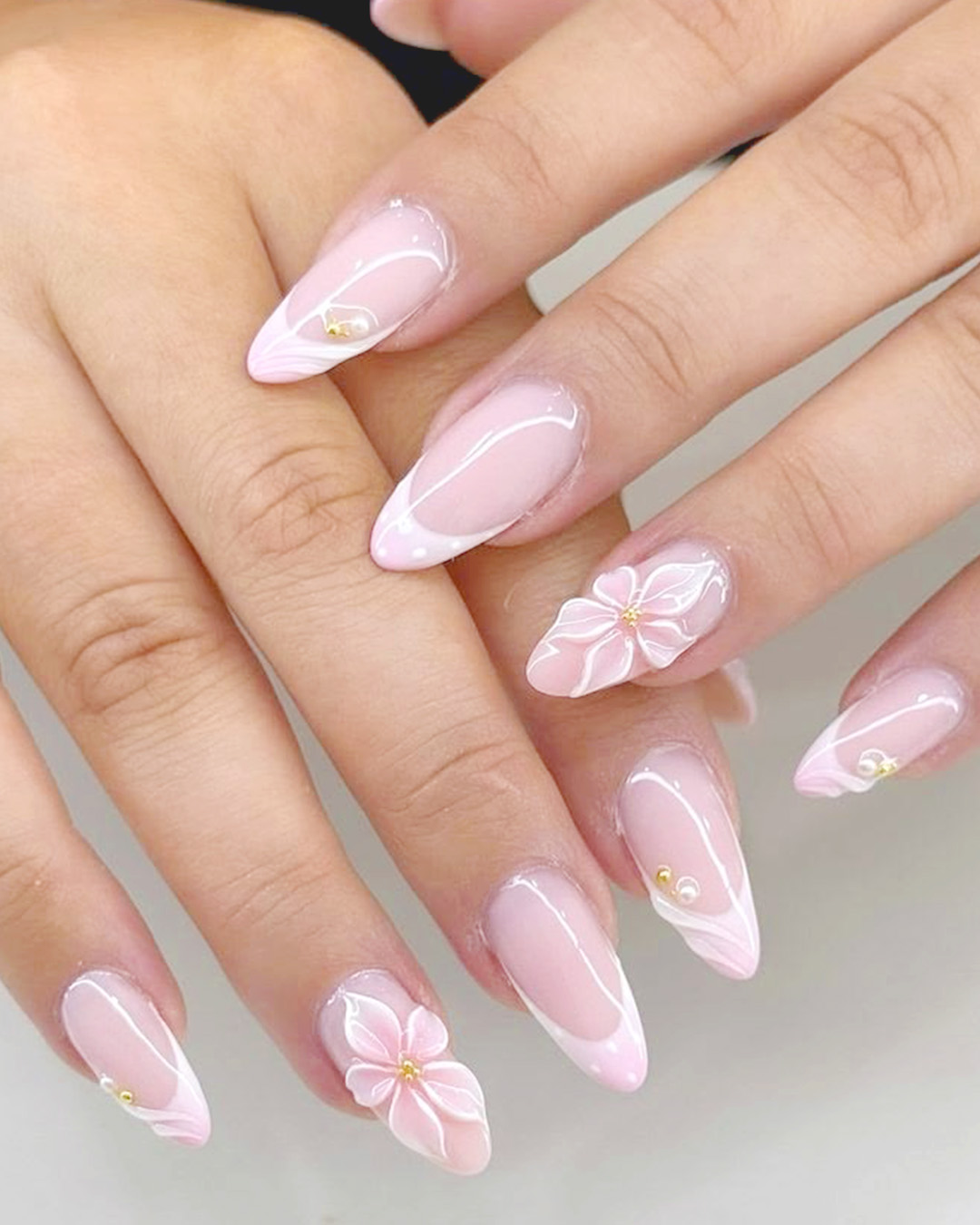 floral wedding nails design with soft pink gel and 3D flower art, romantic bridal nails