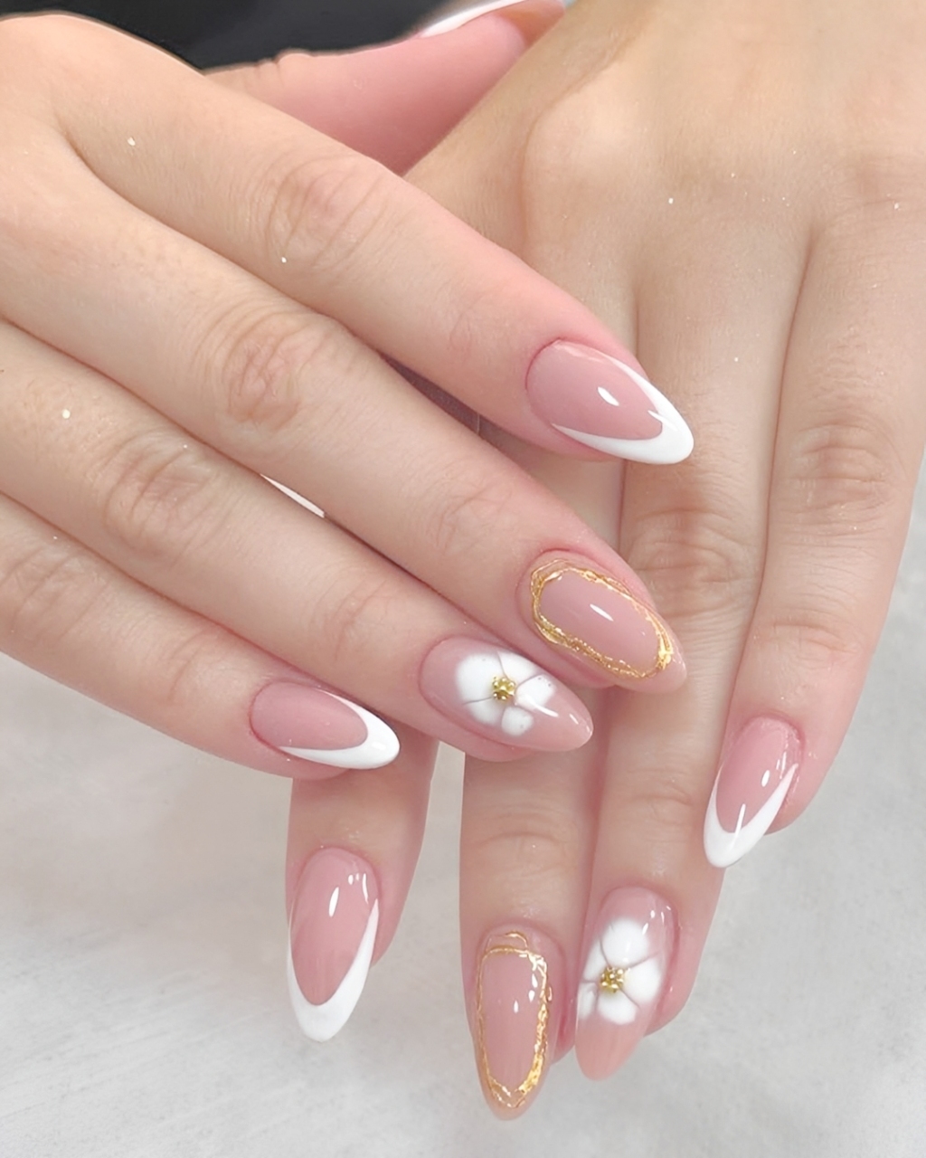 elegant wedding nails with french tip and floral design in Texas at Plush Nail Bar