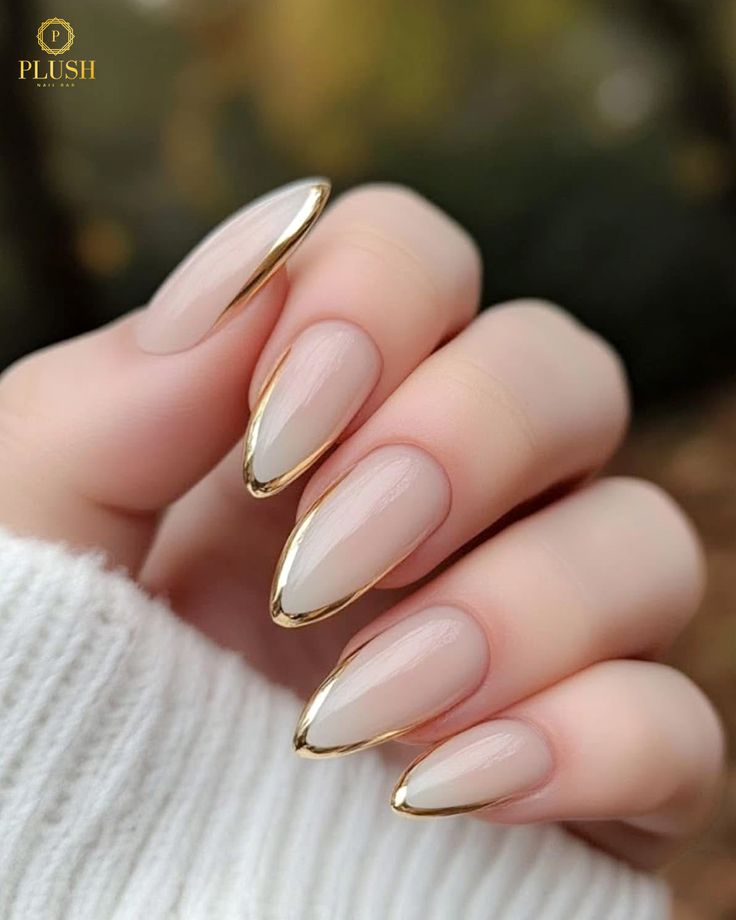 Top 9 Trending Nails at Plush Nail Bar You’ll Love Right Now 6 Gold outline French nails with nude base, elegant and modern nail design