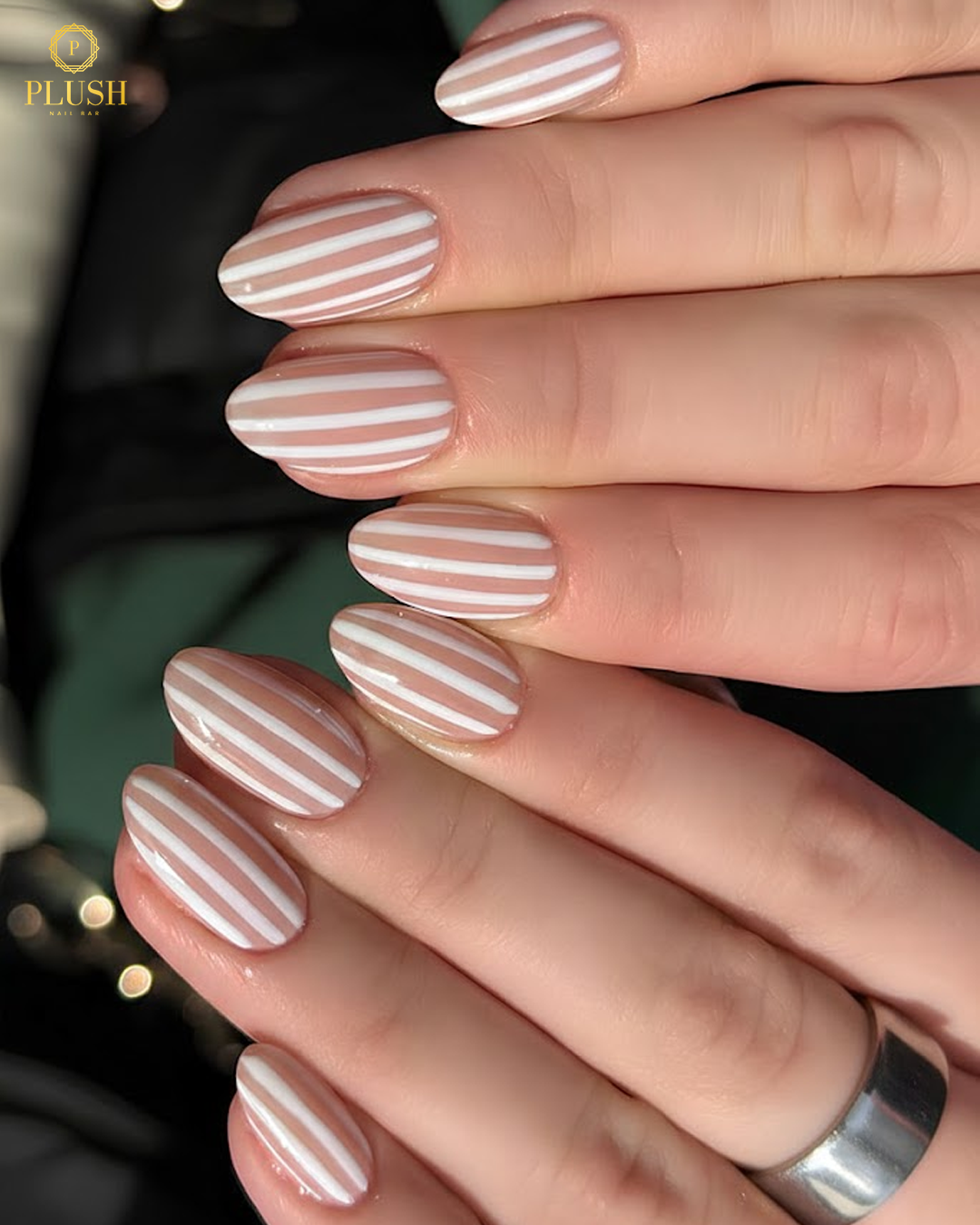 Top 9 Trending Nails at Plush Nail Bar You’ll Love Right Now 5 Minimal striped nails with white lines on nude base, simple trending nails