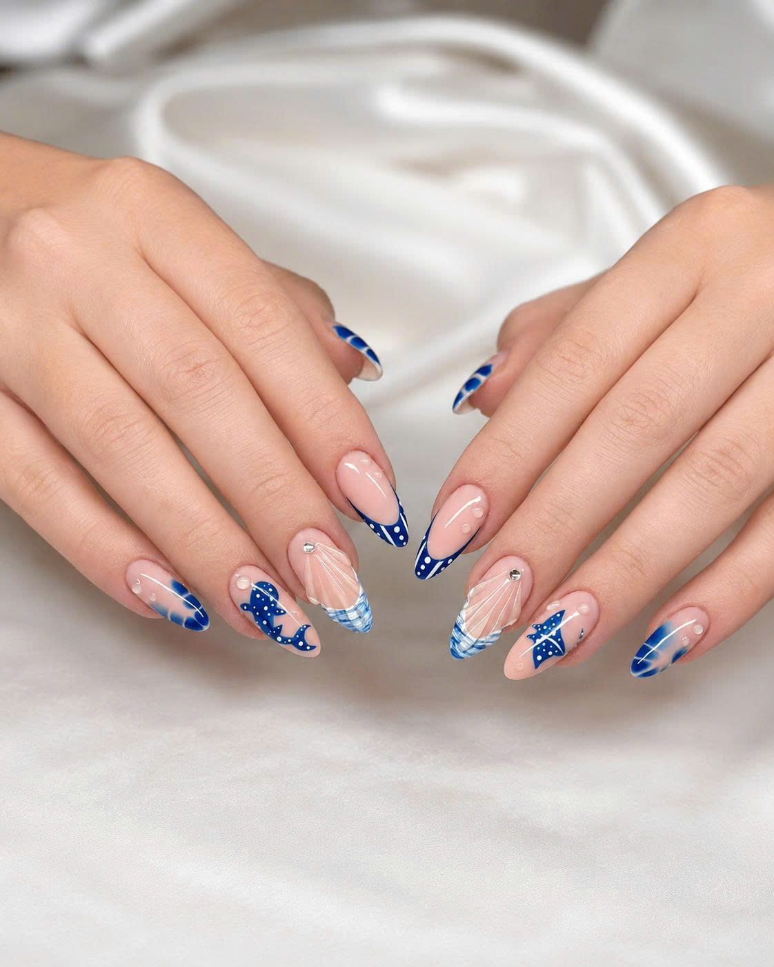 Summer Nail Trends 2026 baby blue ribbon nails with elegant bow details at Plush Nail Bar